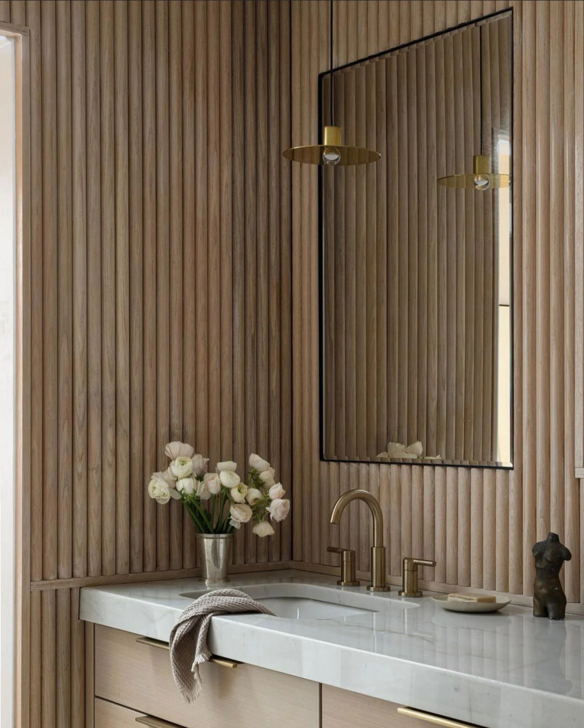 Timeline Fluted Round solid wood wall panel showing beaded half round reeded acoustic profile installed as fluted slat wall tambour paneling in real hardwood