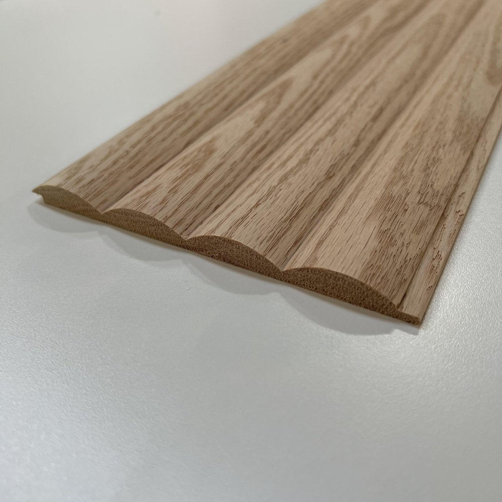 Timeline Fluted Thin Round solid wood wall panel showing beaded half round profile installed as fluted tambour slat wall paneling for acoustic wall paneling in real hardwood
